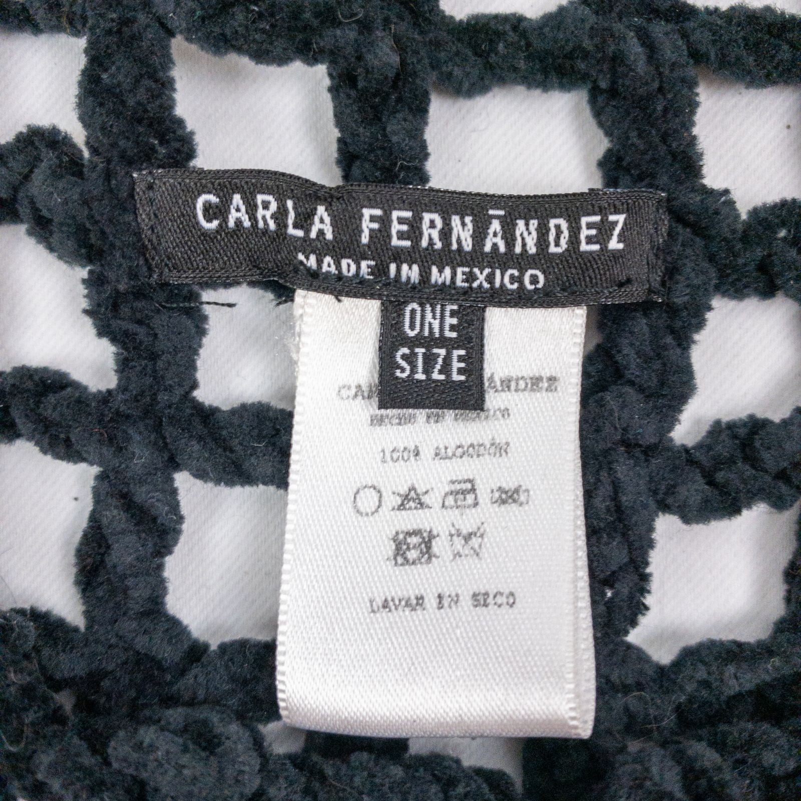 Carla Fernandez black fishnet knit rope sweater with short sleeves displayed on a hanger against a white background image 10