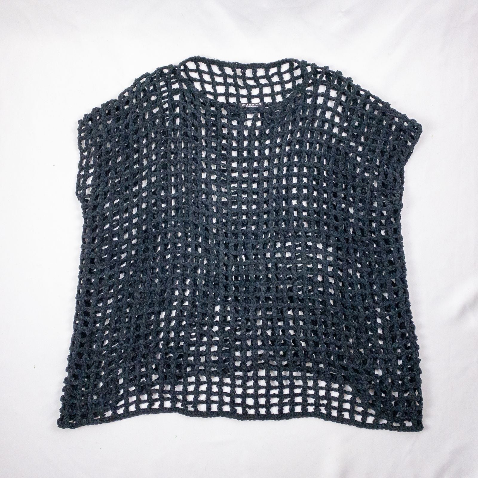 Carla Fernandez black fishnet knit rope sweater with short sleeves displayed on a hanger against a white background image 13