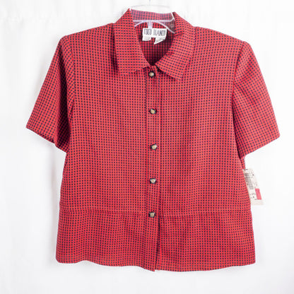 Coco Blanco vintage red and black checkered shirt with ornate buttons and short sleeves on hanger