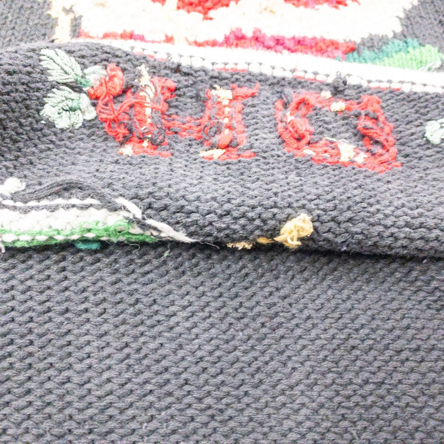 Tiara vintage black knitted sweater with embroidered Santa Claus and snowflakes, red and white striped trim image 9