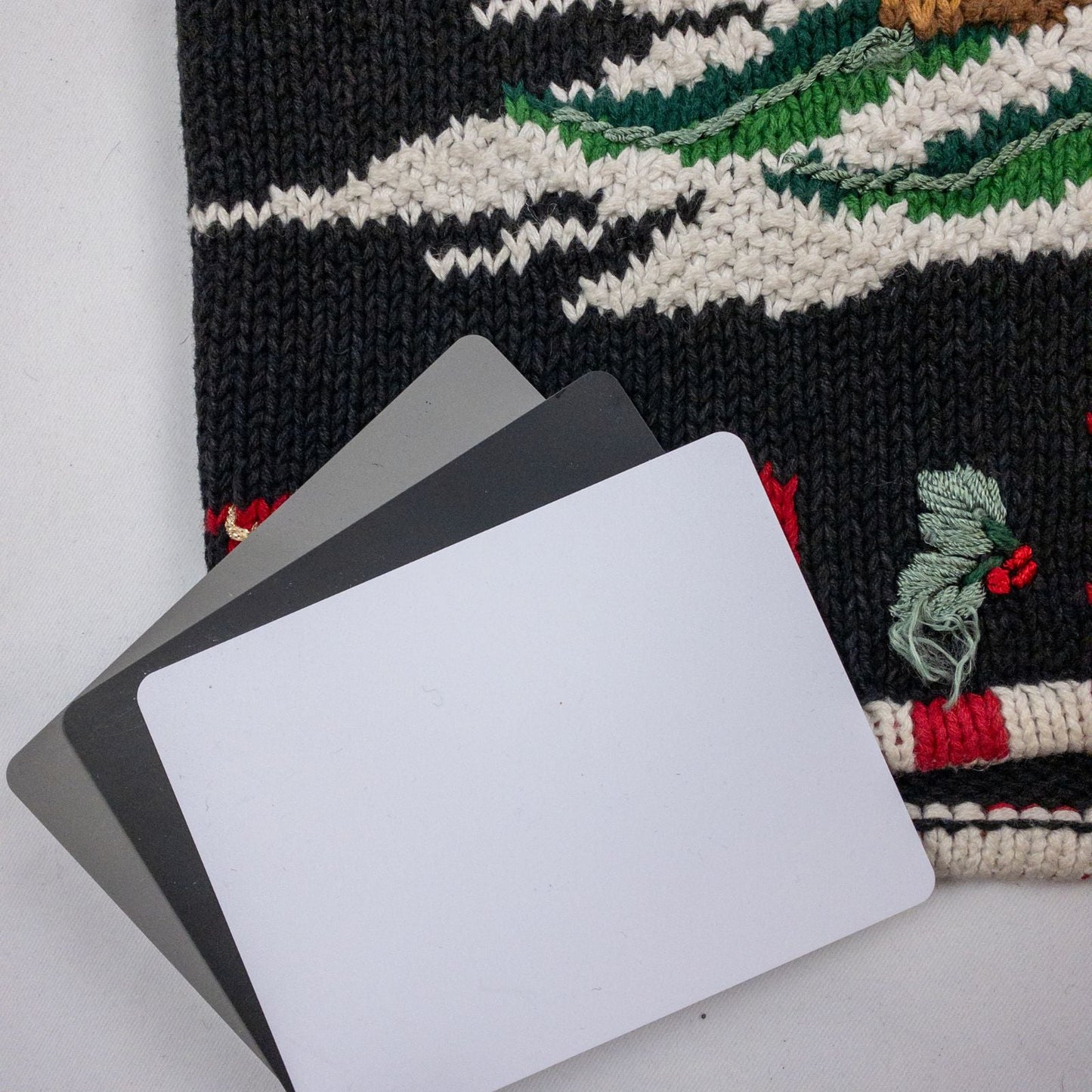 Tiara vintage black knitted sweater with embroidered Santa Claus and snowflakes, red and white striped trim image 10