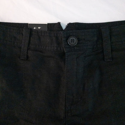 Calvin Klein black linen women's shorts size 4 with button details and front and back pockets displayed on white background image 2