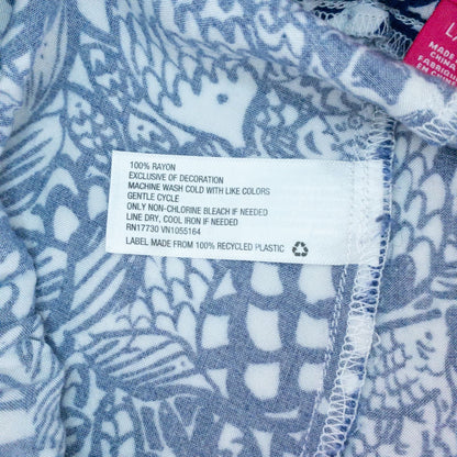 Lily Pullitzer blue fish print lounge shorts with pom pom trim and drawstring waistband laid flat image 12