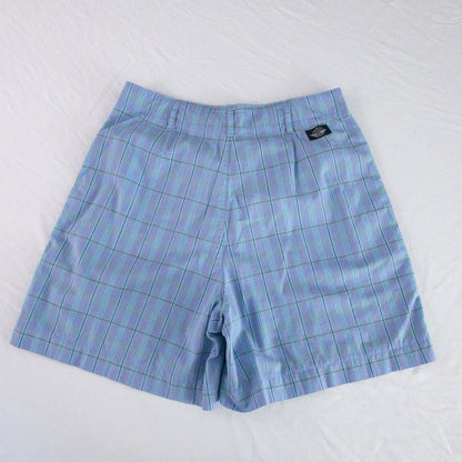 Levis Dockers purple plaid women's shorts laid flat showing front, side pockets, waistband details, and small wear dot image 8