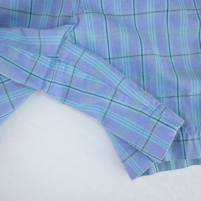 Levis Dockers purple plaid women's shorts laid flat showing front, side pockets, waistband details, and small wear dot image 4