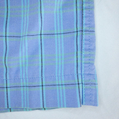 Levis Dockers purple plaid women's shorts laid flat showing front, side pockets, waistband details, and small wear dot image 6