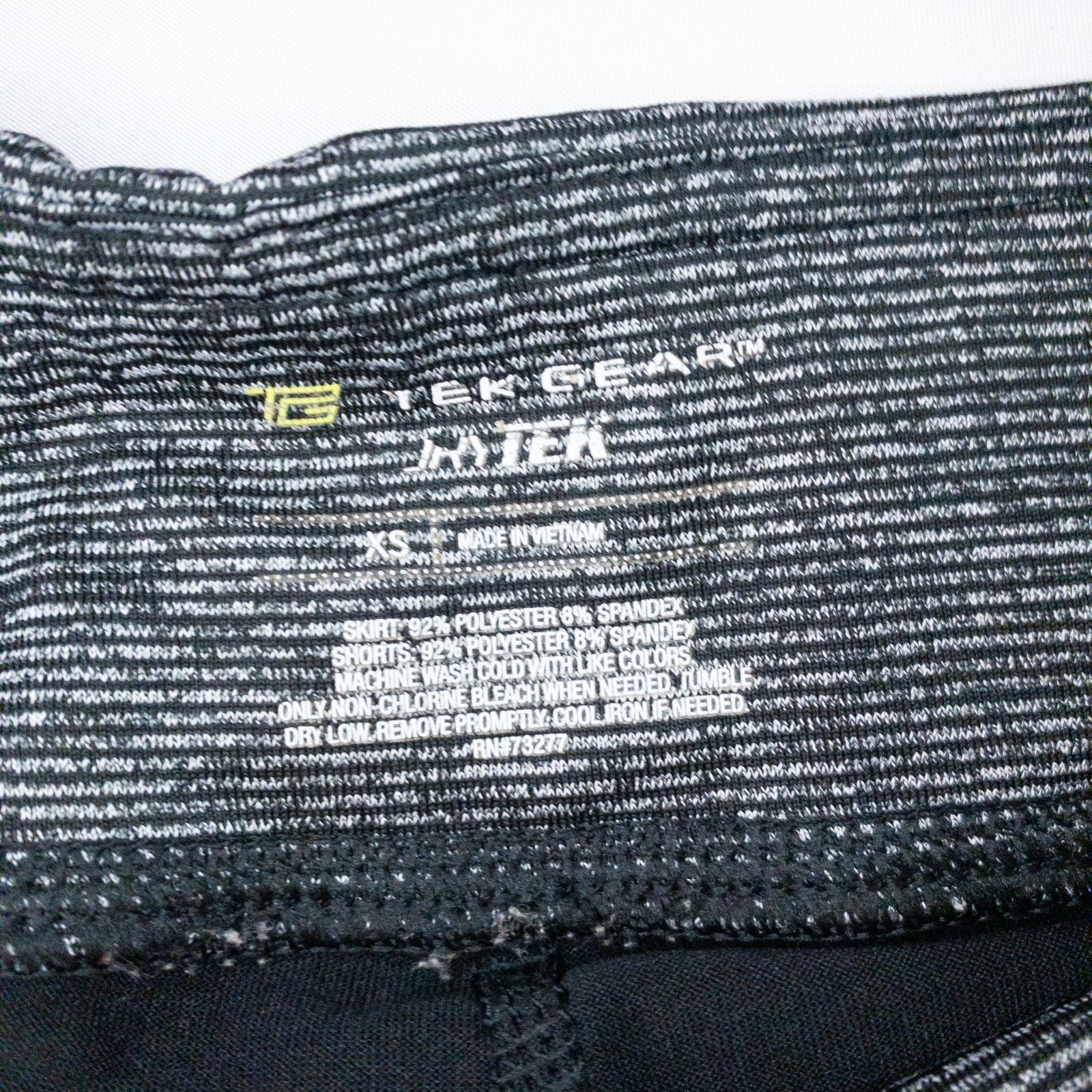 Tekgear black gray striped skorts womens XSmall with elastic waistband and inner shorts, detailed close-ups of fabric and logo image 6