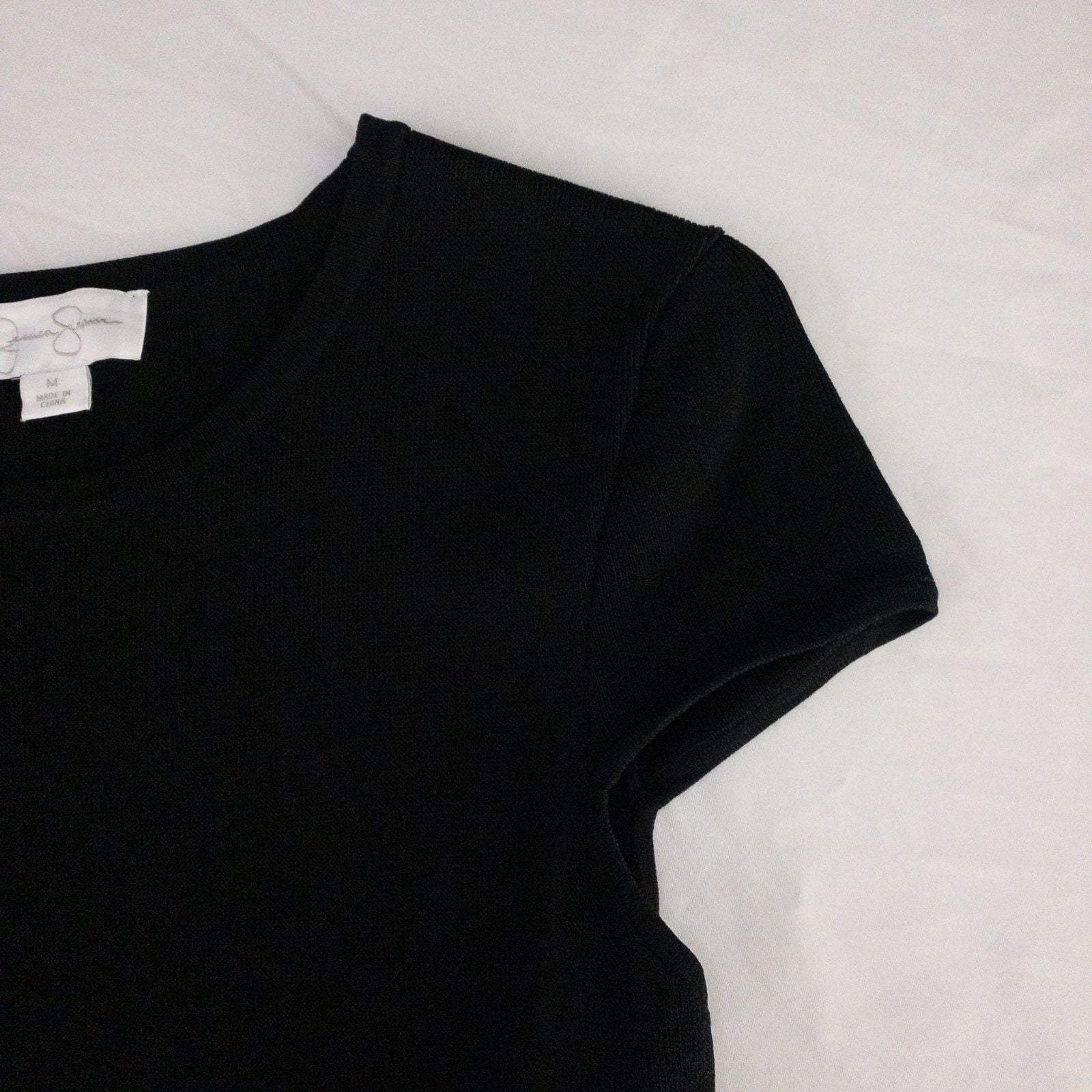 Jessica Simpson black knit fit and flare dress with short sleeves and flared skirt image 5
