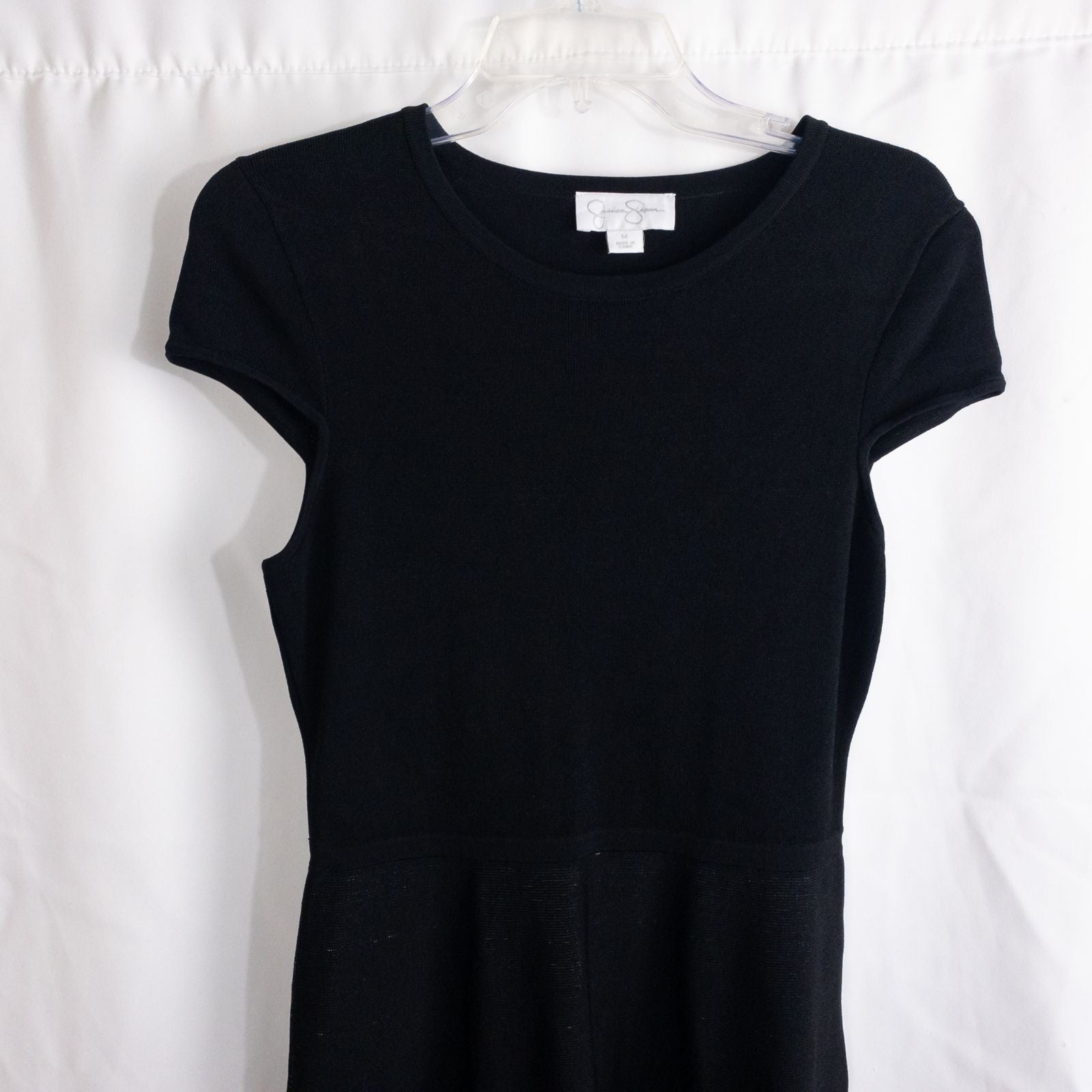 Jessica Simpson black knit fit and flare dress with short sleeves and flared skirt image 2