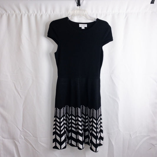 Jessica Simpson black knit fit and flare dress with short sleeves and flared skirt