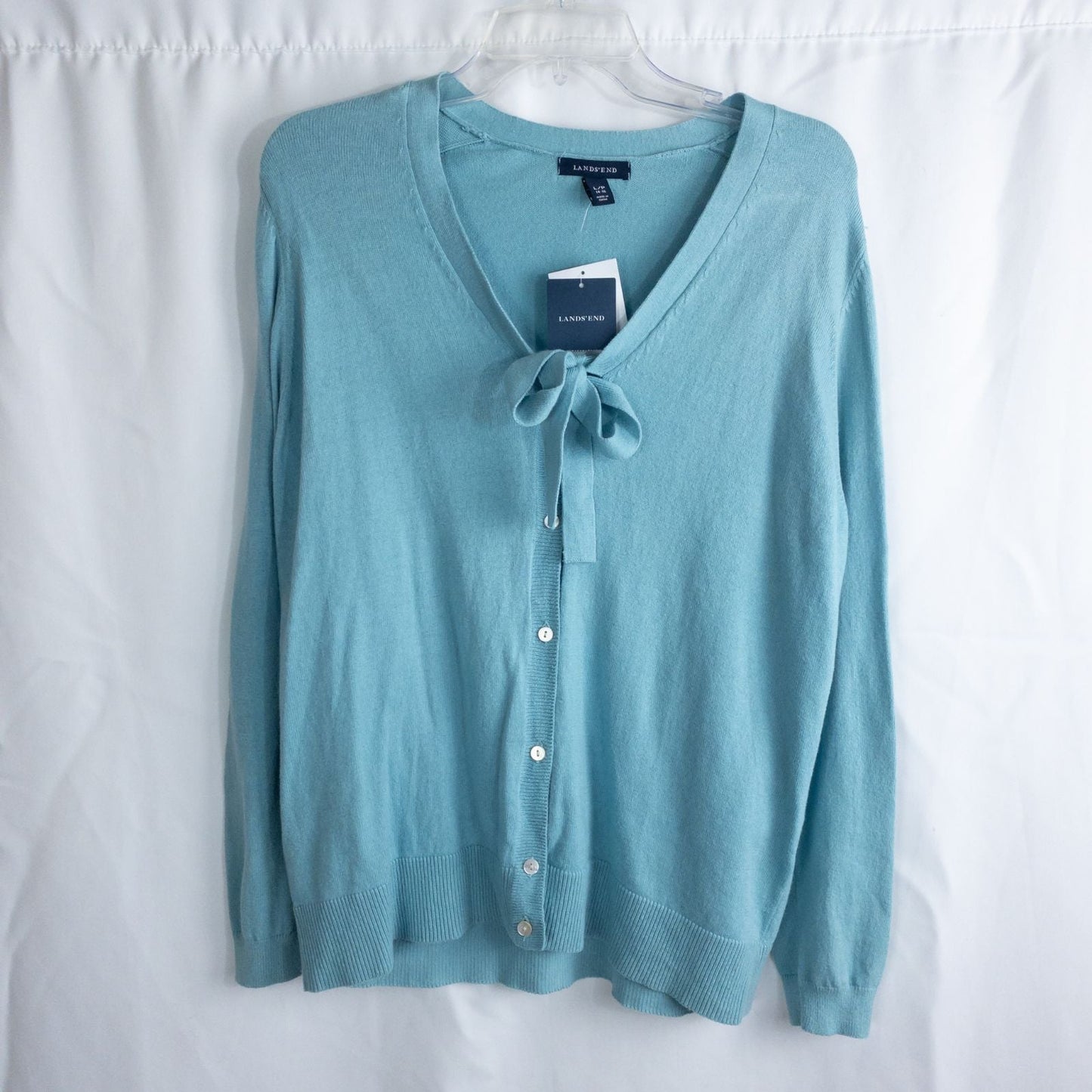 Lands End marine blue cotton cashmere tie cardigan with buttons and bow neck detail for women, size large, new with tags