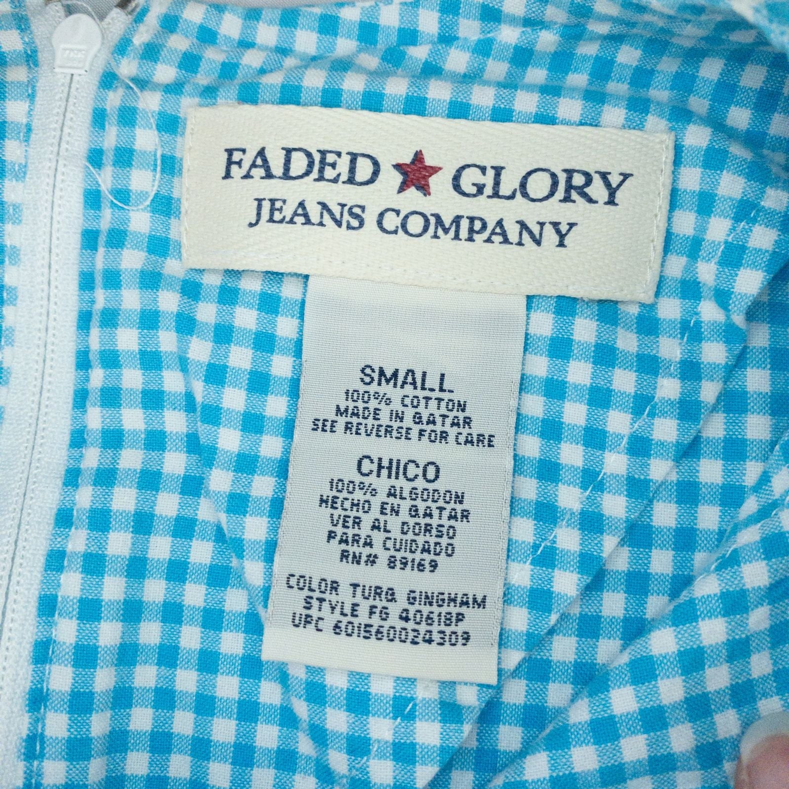 Faded Glory vintage blue and white gingham sleeveless dress with v-neck and back zipper on clear hanger against white background image 10