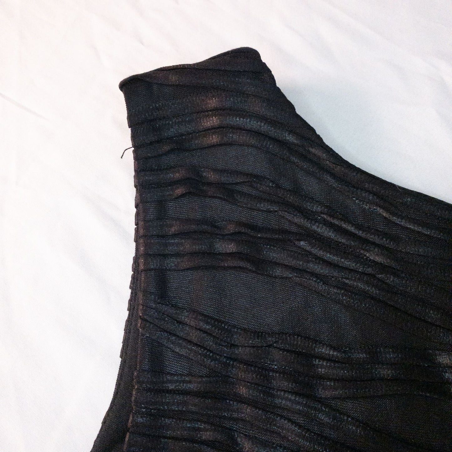 Joseph Ribkoff black pleated sleeveless minidress hanging on hanger with textured fabric image 9
