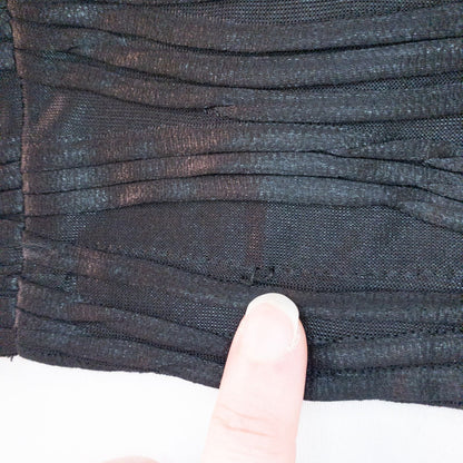 Joseph Ribkoff black pleated sleeveless minidress hanging on hanger with textured fabric image 11