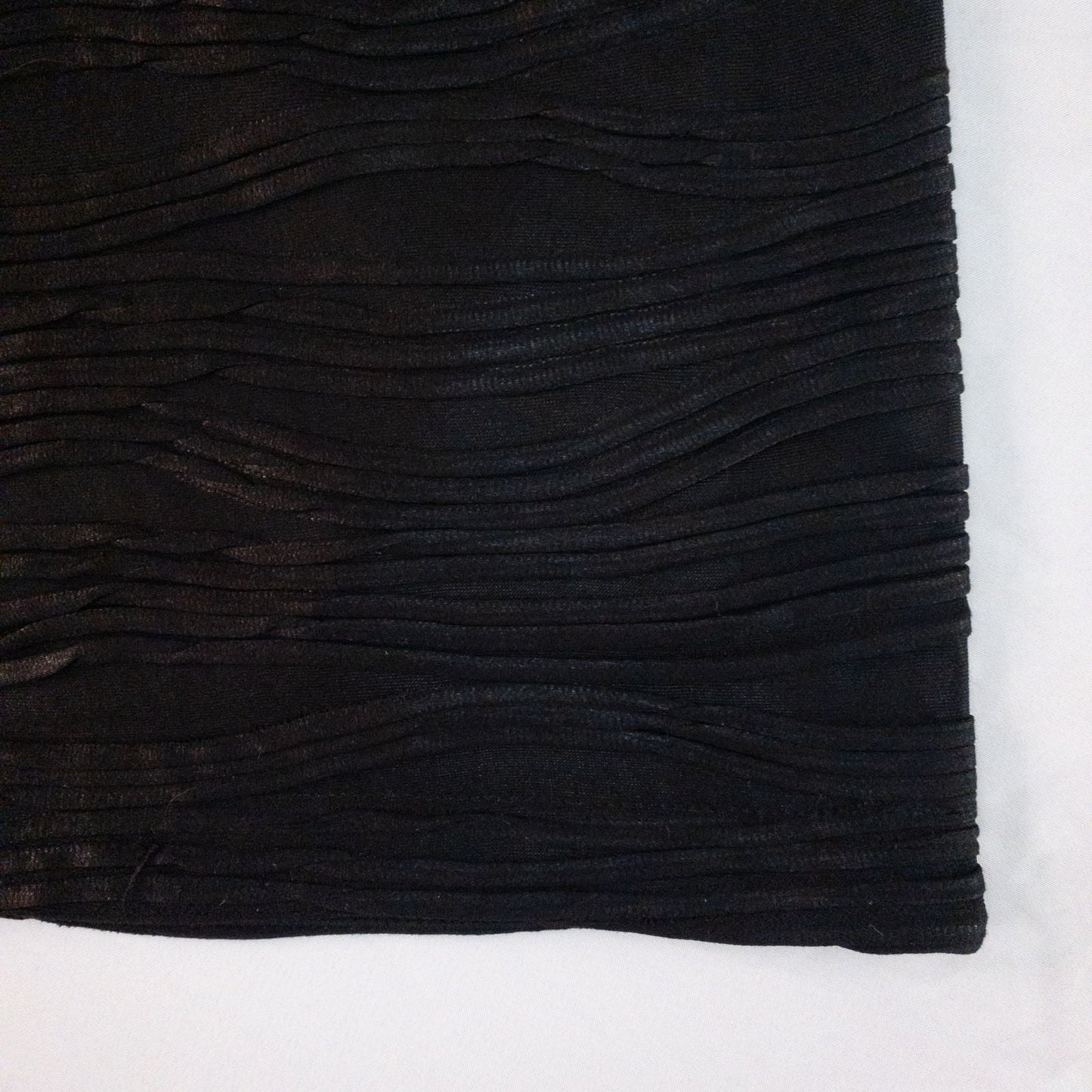Joseph Ribkoff black pleated sleeveless minidress hanging on hanger with textured fabric image 4