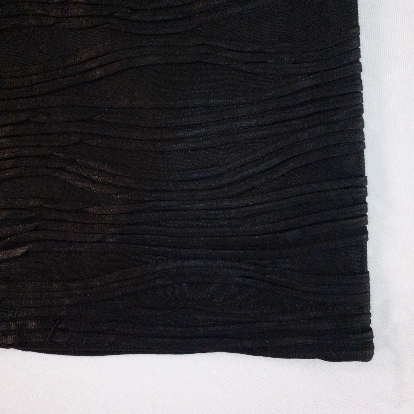Joseph Ribkoff black pleated sleeveless minidress hanging on hanger with textured fabric image 4