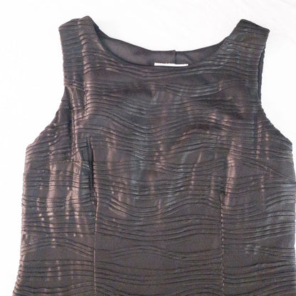 Joseph Ribkoff black pleated sleeveless minidress hanging on hanger with textured fabric image 3