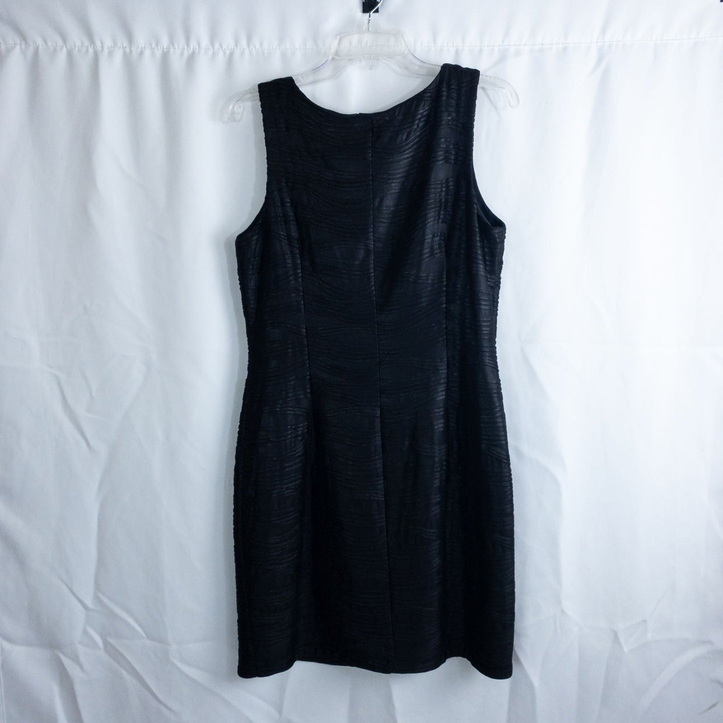Joseph Ribkoff black pleated sleeveless minidress hanging on hanger with textured fabric image 6