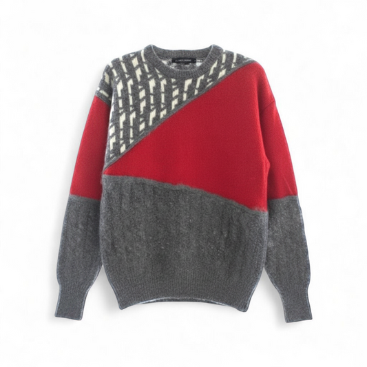 Vintage 1990s red grey wool sweater with color block abstract pattern and padded shoulders front on white muslin photography backdrop