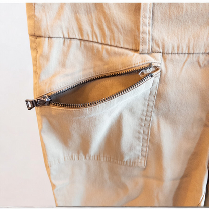 Guess vintage Y2K khaki flare pants with zippered pockets and relaxed fit hanging on a hanger image 3