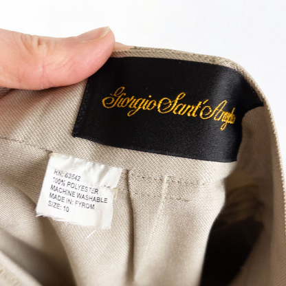 Giorgio Sant Angelo tan vintage pants with front pleats and dual button closure hanging on hanger image 10