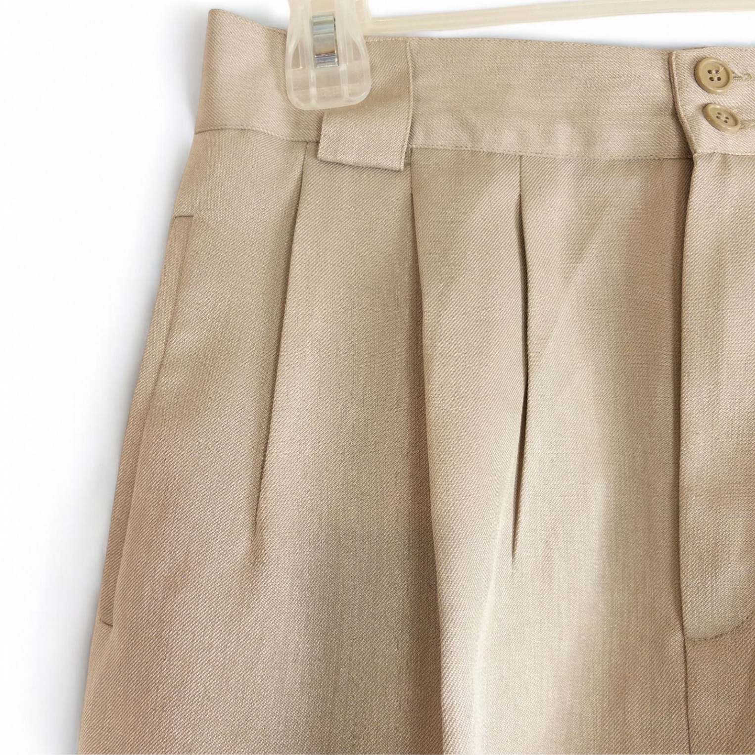 Giorgio Sant Angelo tan vintage pants with front pleats and dual button closure hanging on hanger image 3