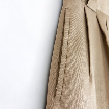 Giorgio Sant Angelo tan vintage pants with front pleats and dual button closure hanging on hanger image 4