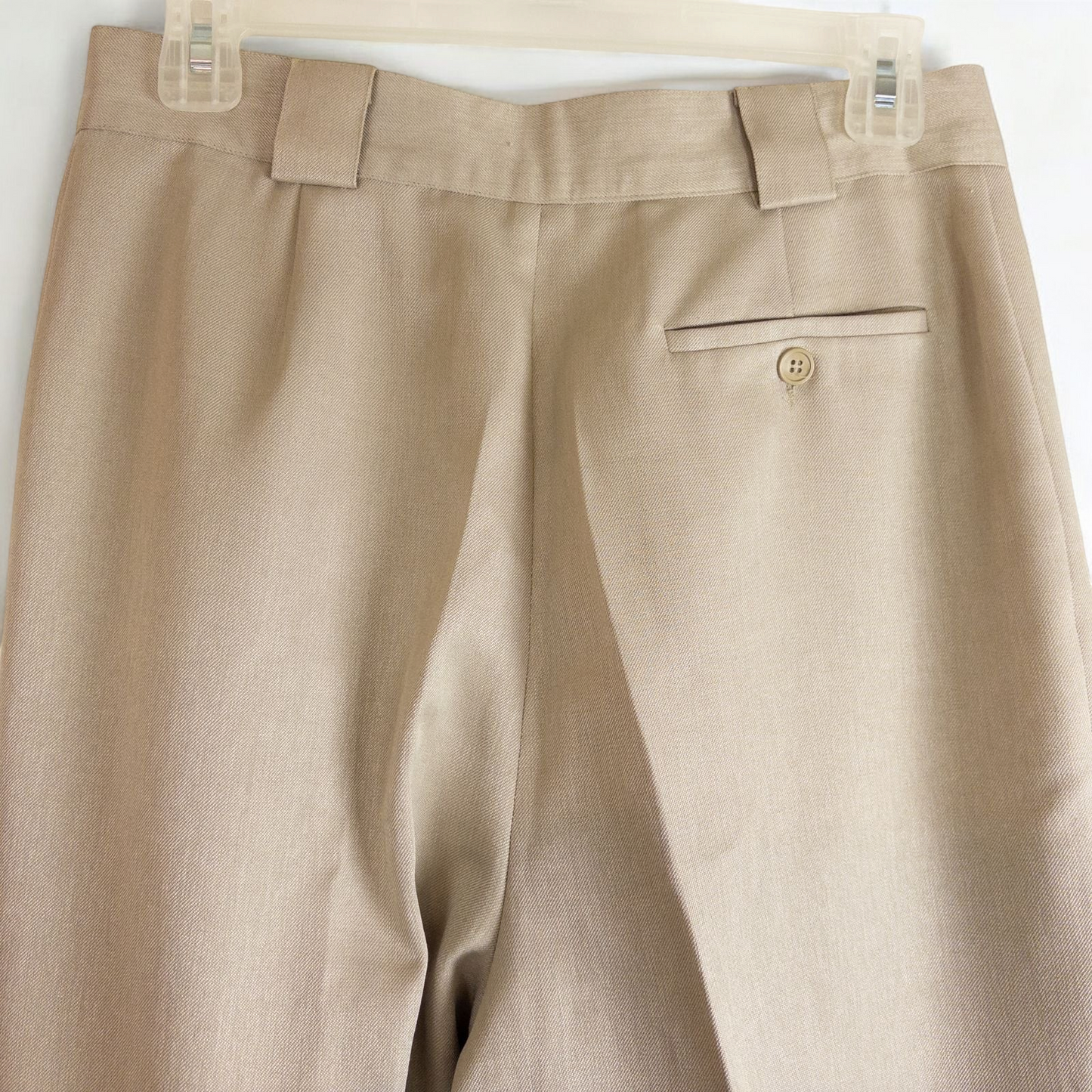 Giorgio Sant Angelo tan vintage pants with front pleats and dual button closure hanging on hanger image 9