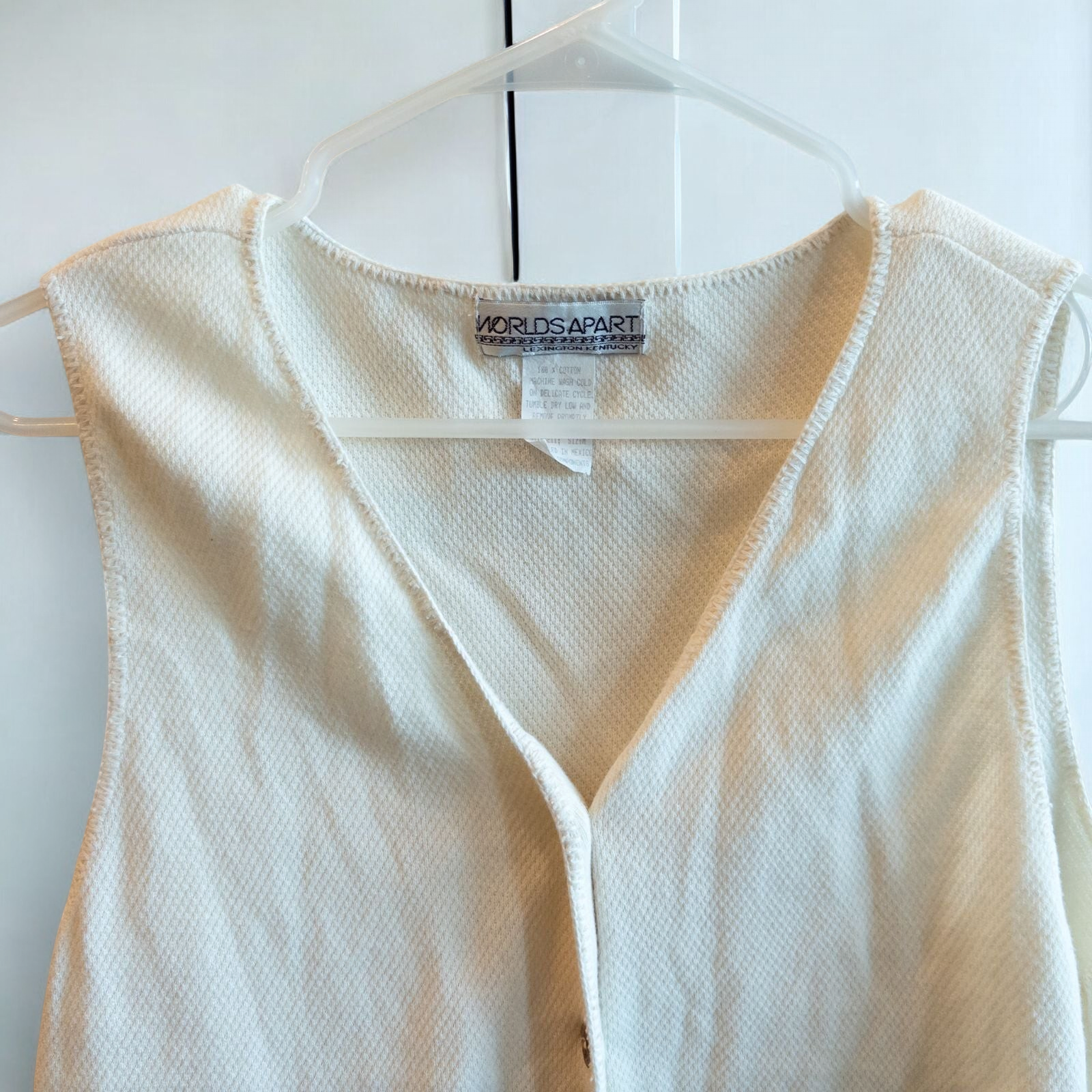 White Worlds Apart vintage cotton vest with button front on hanger image 2