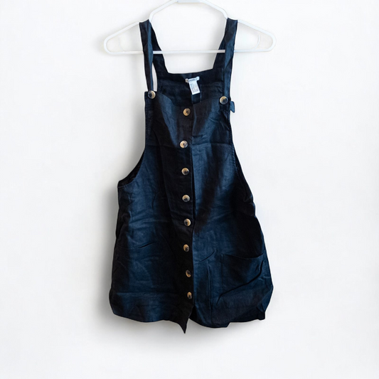Forever 21 black linen dress with button front and adjustable straps hanging on a white hanger