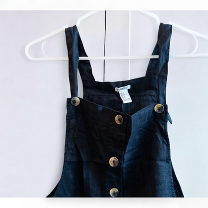 Forever 21 black linen dress with button front and adjustable straps hanging on a white hanger image 2
