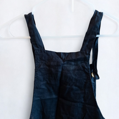 Forever 21 black linen dress with button front and adjustable straps hanging on a white hanger image 6