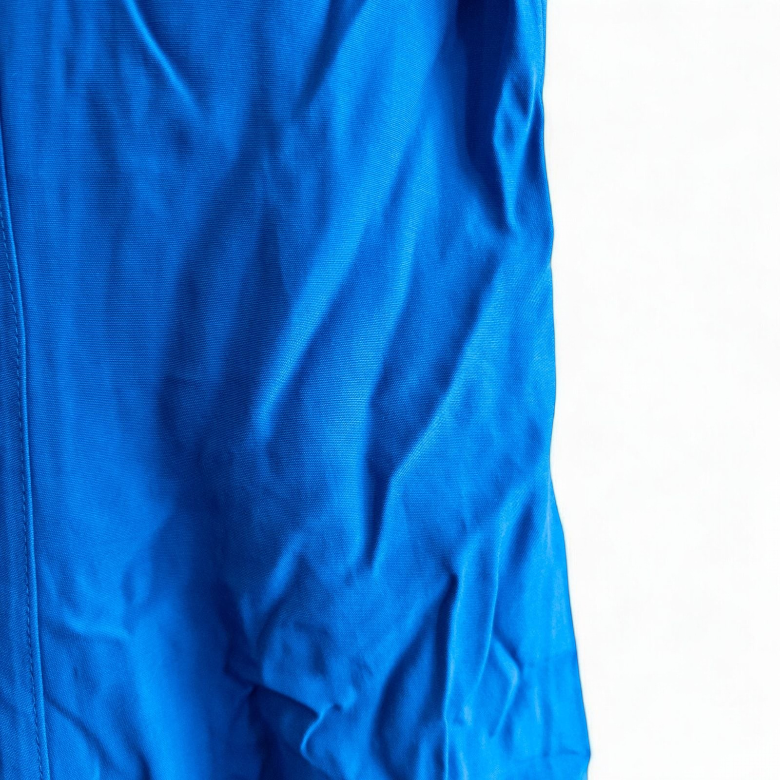 Piccalino vintage blue long sailor dress with white collar and cuff accents, button front, and short sleeves laid flat. image 9