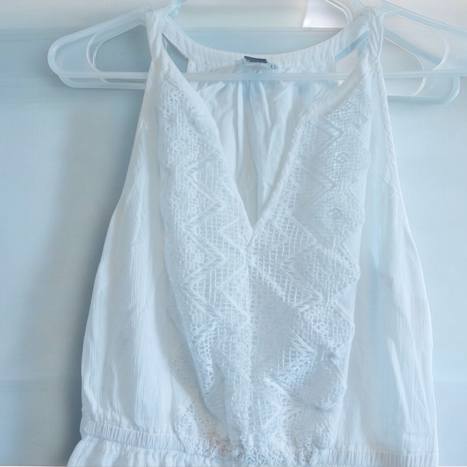 Old Navy long white sleeveless lace maxi dress hanging on hanger in room image 2