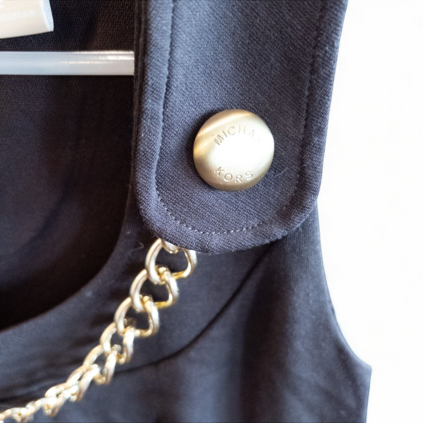 MICHAEL Michael Kors brown sleeveless dress with gold chain detail and back zipper closure on hanger image 3