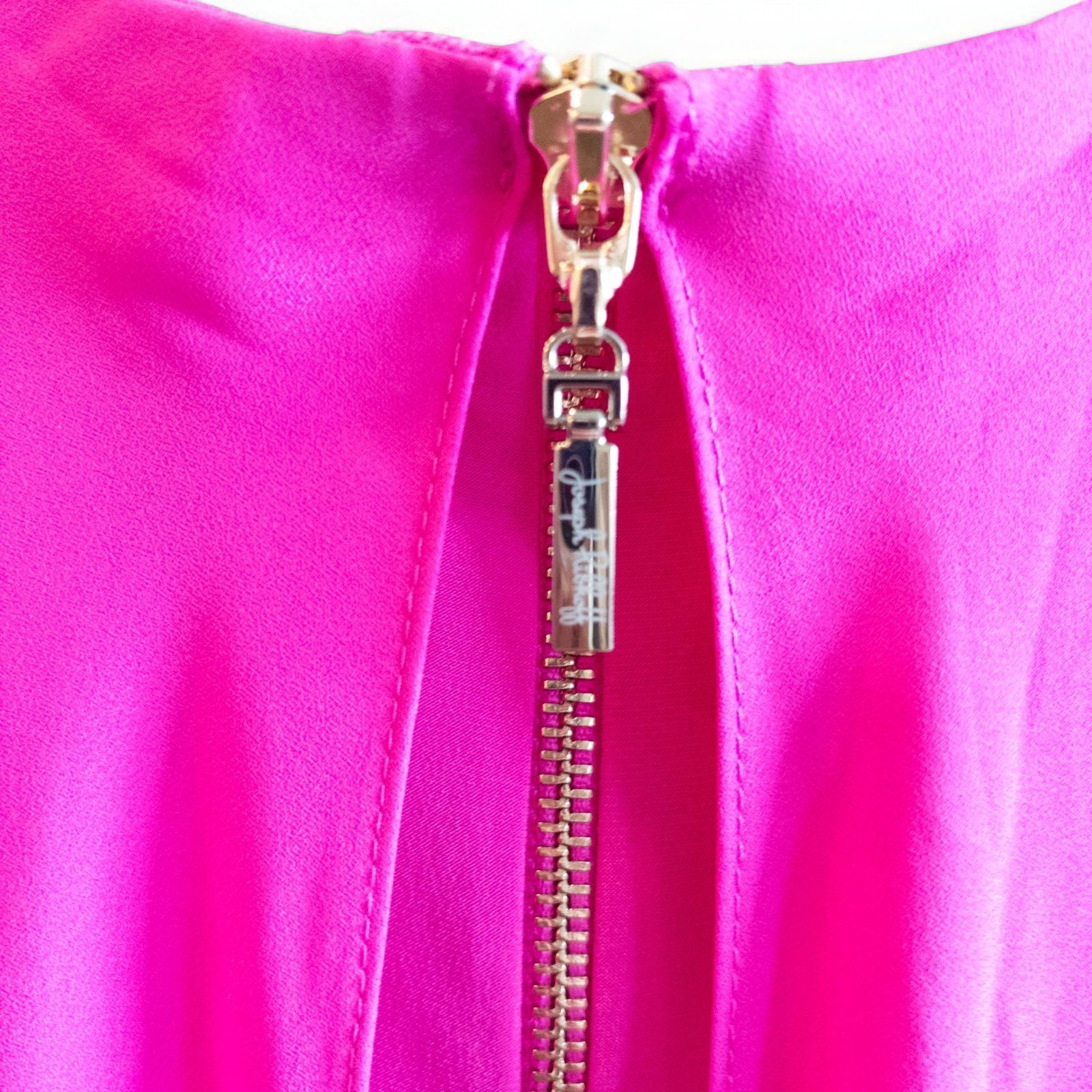 Joseph Ribkoff pink sleeveless dress with asymmetrical layered detail and back zipper on hanger image 8