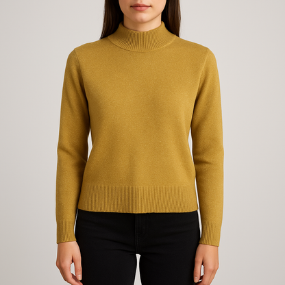 Dress Barn petite gold knit sweater with mock neck and long sleeves hung on a clear hanger on model
