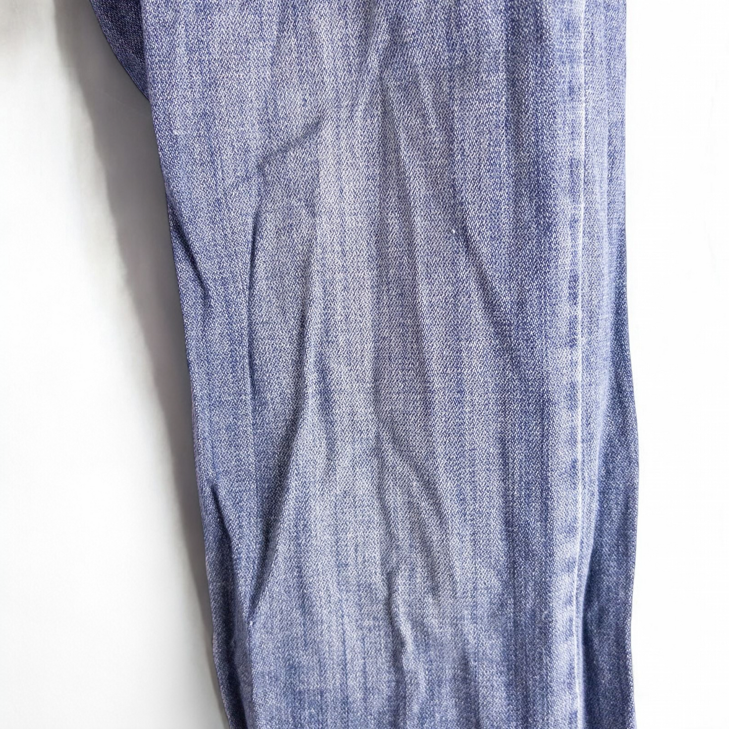 Perry Ellis women's blue denim jeans with five pockets hanging on a hanger front and back views image 6
