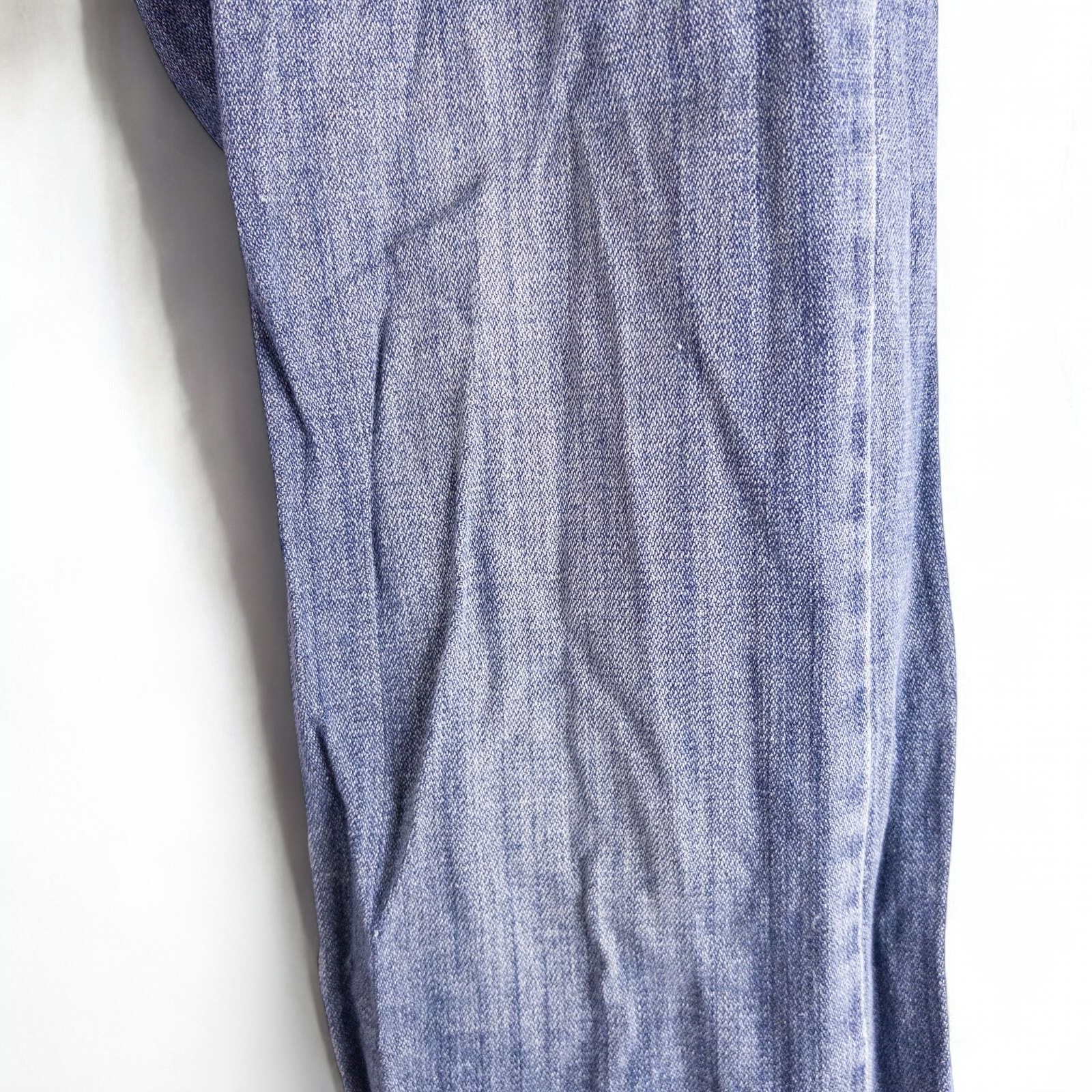 Perry Ellis women's blue denim jeans with five pockets hanging on a hanger front and back views image 6