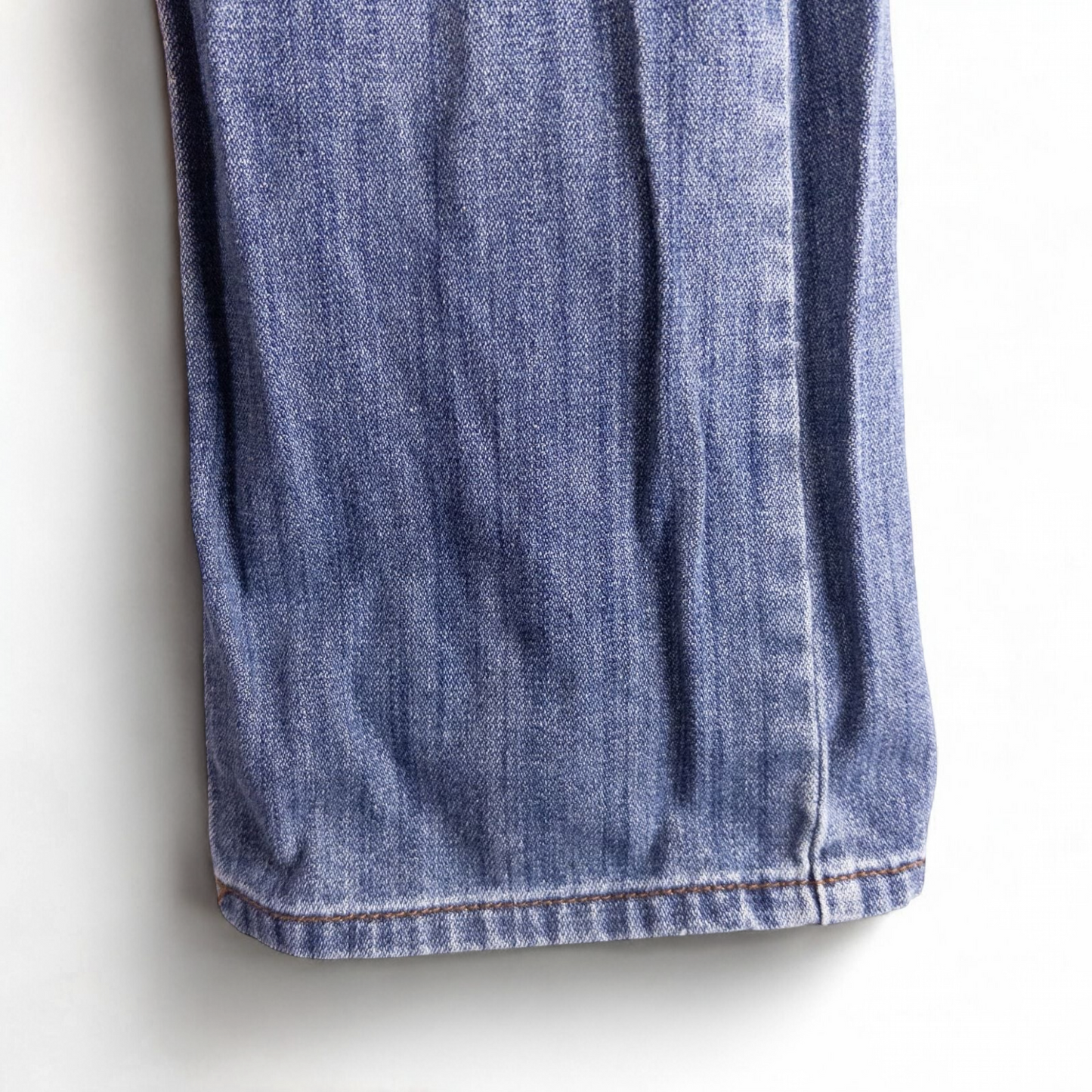 Perry Ellis women's blue denim jeans with five pockets hanging on a hanger front and back views image 7