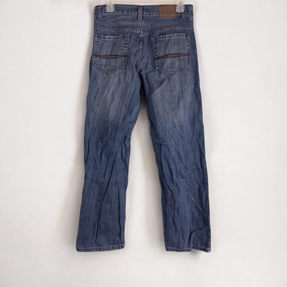 Perry Ellis women's blue denim jeans with five pockets hanging on a hanger front and back views image 8