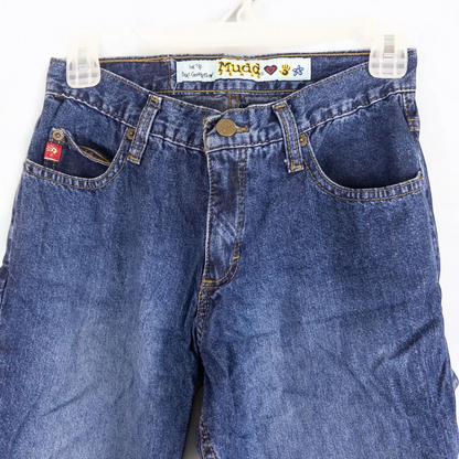 Vintage 1990s Mudd blue denim jeans with button closure hanging on hanger front view image 2