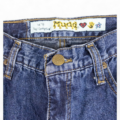Vintage 1990s Mudd blue denim jeans with button closure hanging on hanger front view image 3