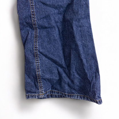 Vintage 1990s Mudd blue denim jeans with button closure hanging on hanger front view image 7