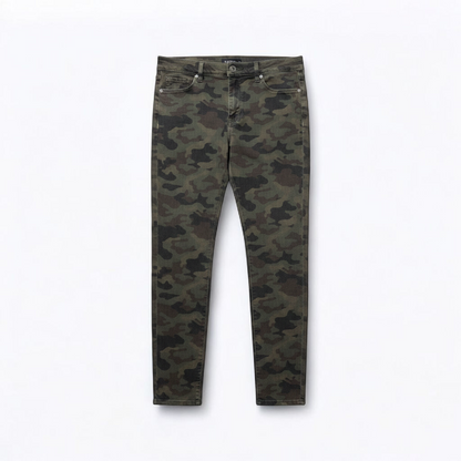 Hudson green camo skinny jeans womens size 31 with minimal wear and faux front pockets displayed hanging. front on white muslin photography backdrop