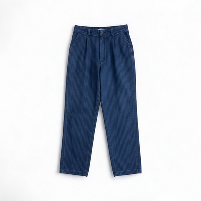 Wilkins rumble seat vintage blue striped jeans womens size 28 hanging on wood hanger in front of white background front on white muslin photography backdrop