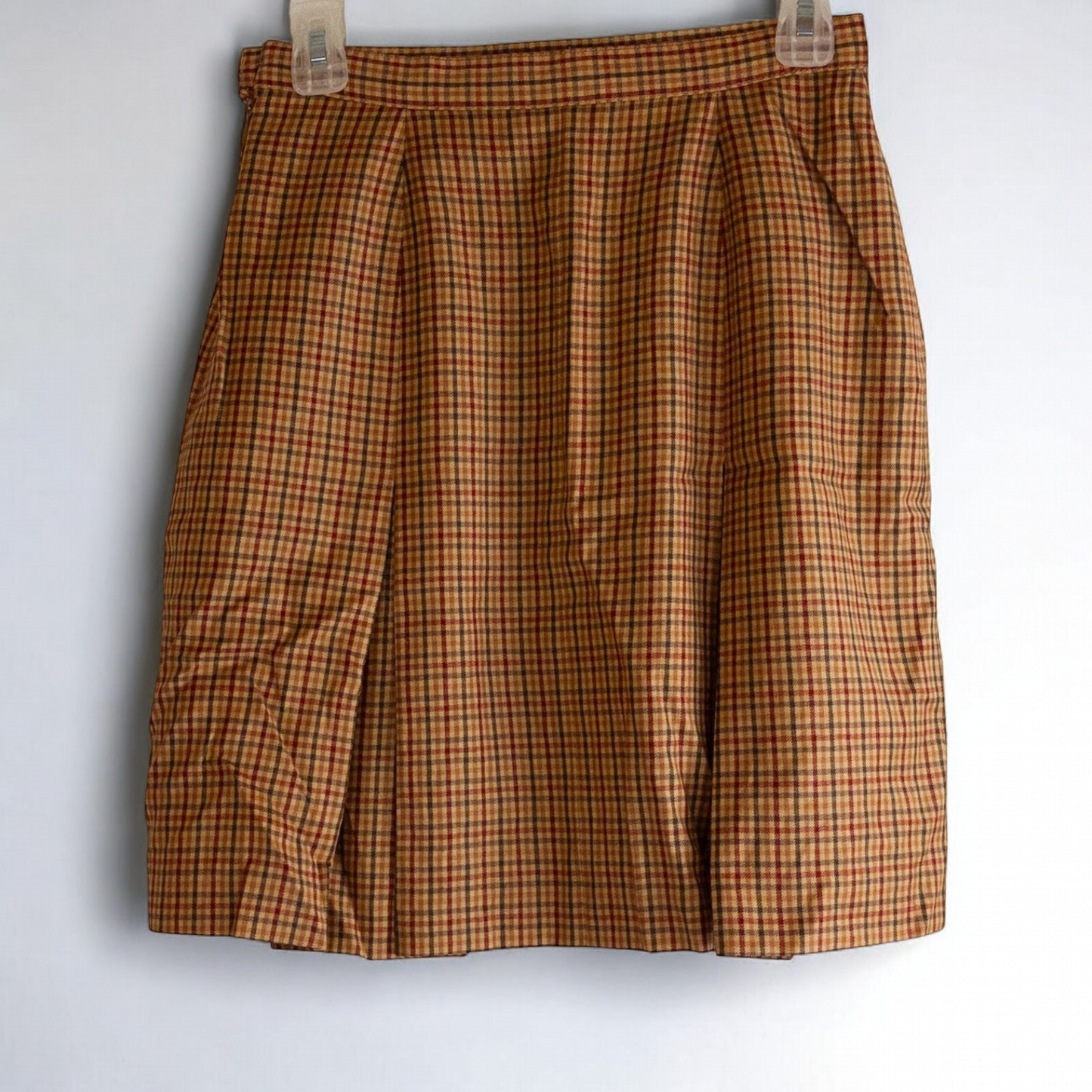 Laura Ashley orange red plaid pleated skirt with side zipper and subtle pockets, front and back views.