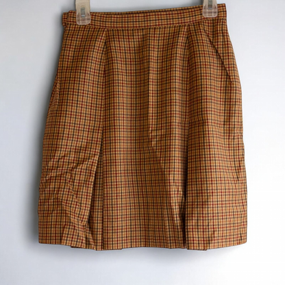 Laura Ashley orange red plaid pleated skirt with side zipper and subtle pockets, front and back views.