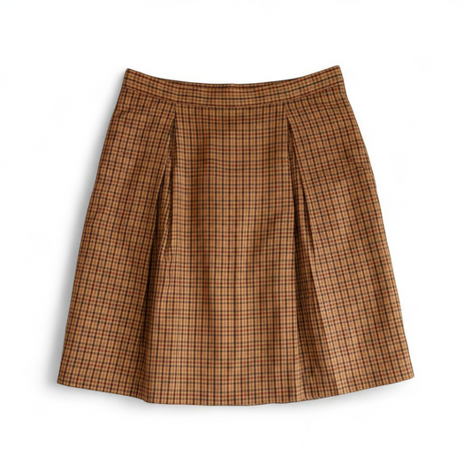Laura Ashley orange red plaid pleated skirt with side zipper and subtle pockets, front and back views. front on white muslin photography backdrop