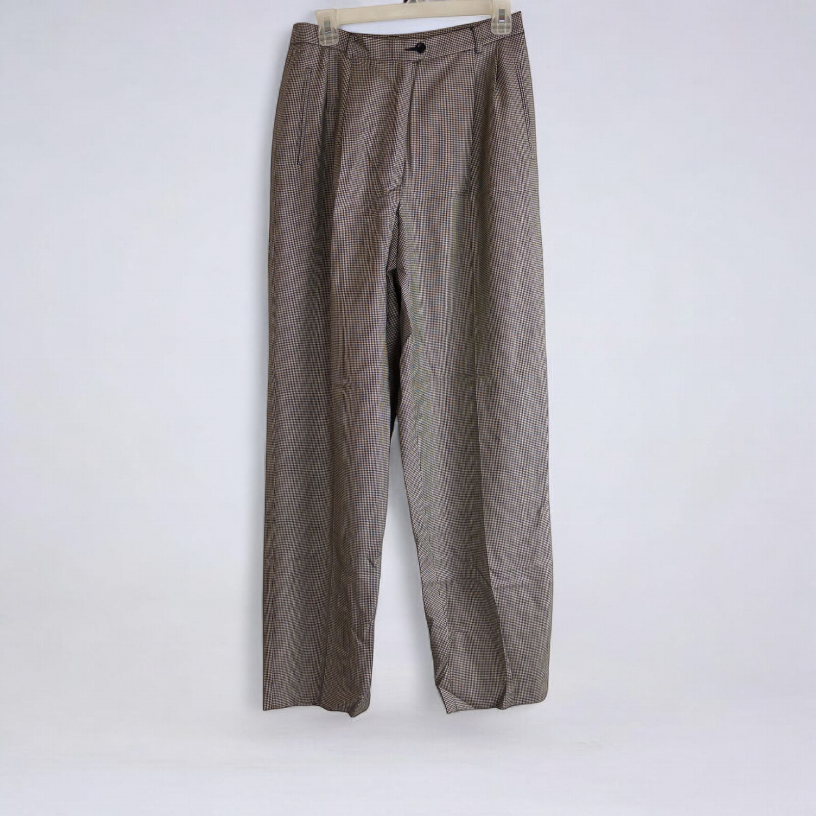 Liz Claiborne vintage black and white houndstooth pants with front zipper and button closure, pleated front, and side pockets